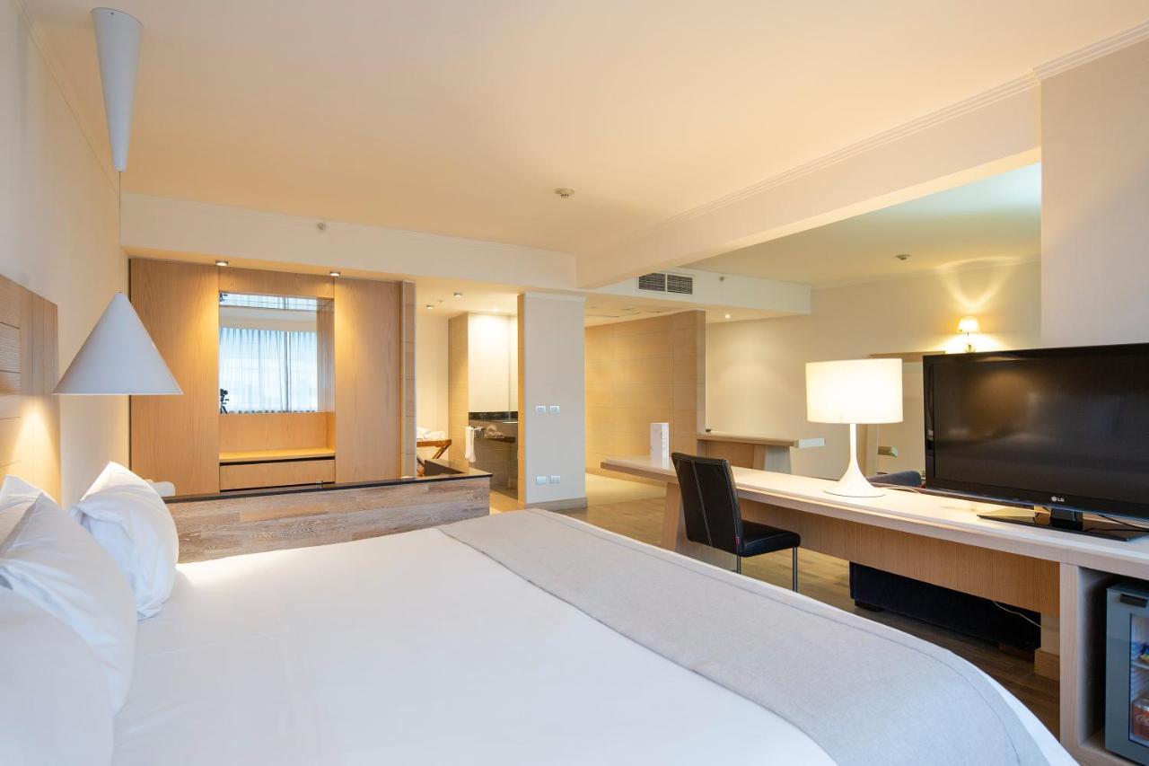 Отель Wyndham Concepcion Pettra Экстерьер фото A room at the hotel
