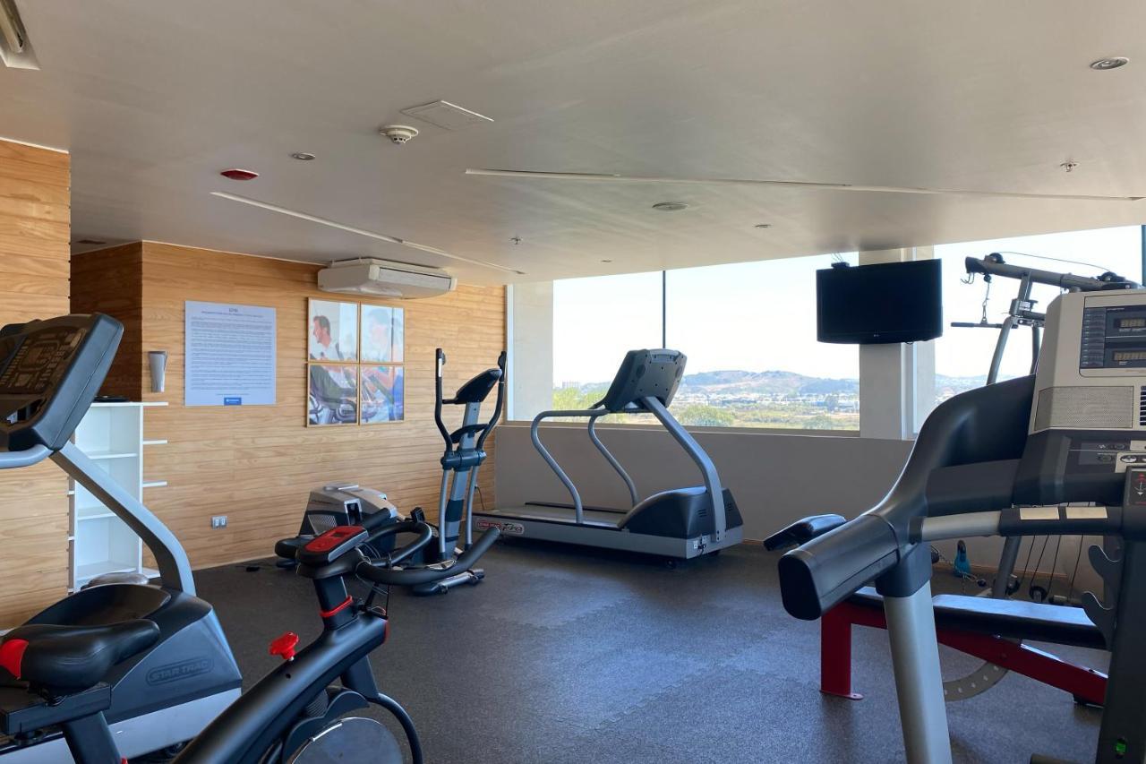 Отель Wyndham Concepcion Pettra Экстерьер фото The gym at the hotel