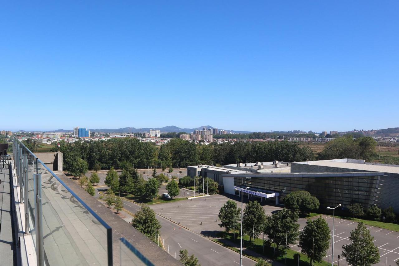 Отель Wyndham Concepcion Pettra Экстерьер фото View of the San Jose skyline from the rooftop of the Fairmont San Jose