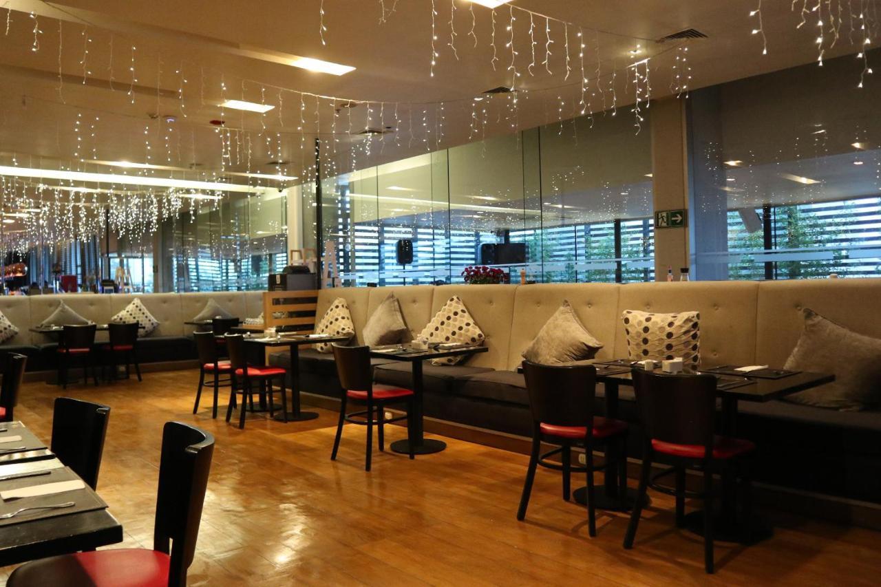 Отель Wyndham Concepcion Pettra Экстерьер фото The interior of the restaurant