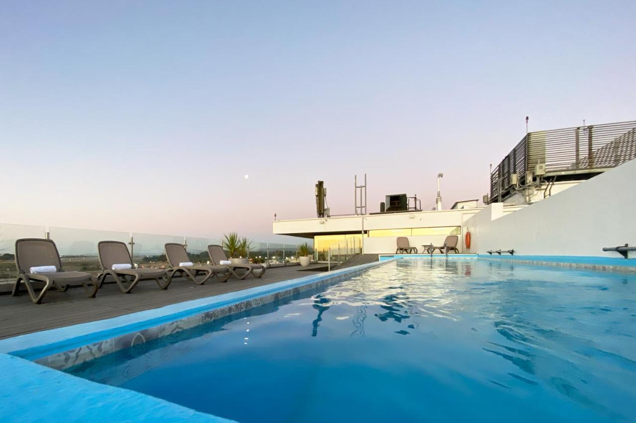 Отель Wyndham Concepcion Pettra Экстерьер фото Rooftop pool